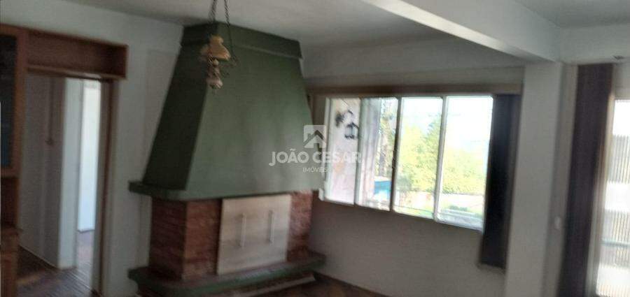 SALA COM LAREIRA